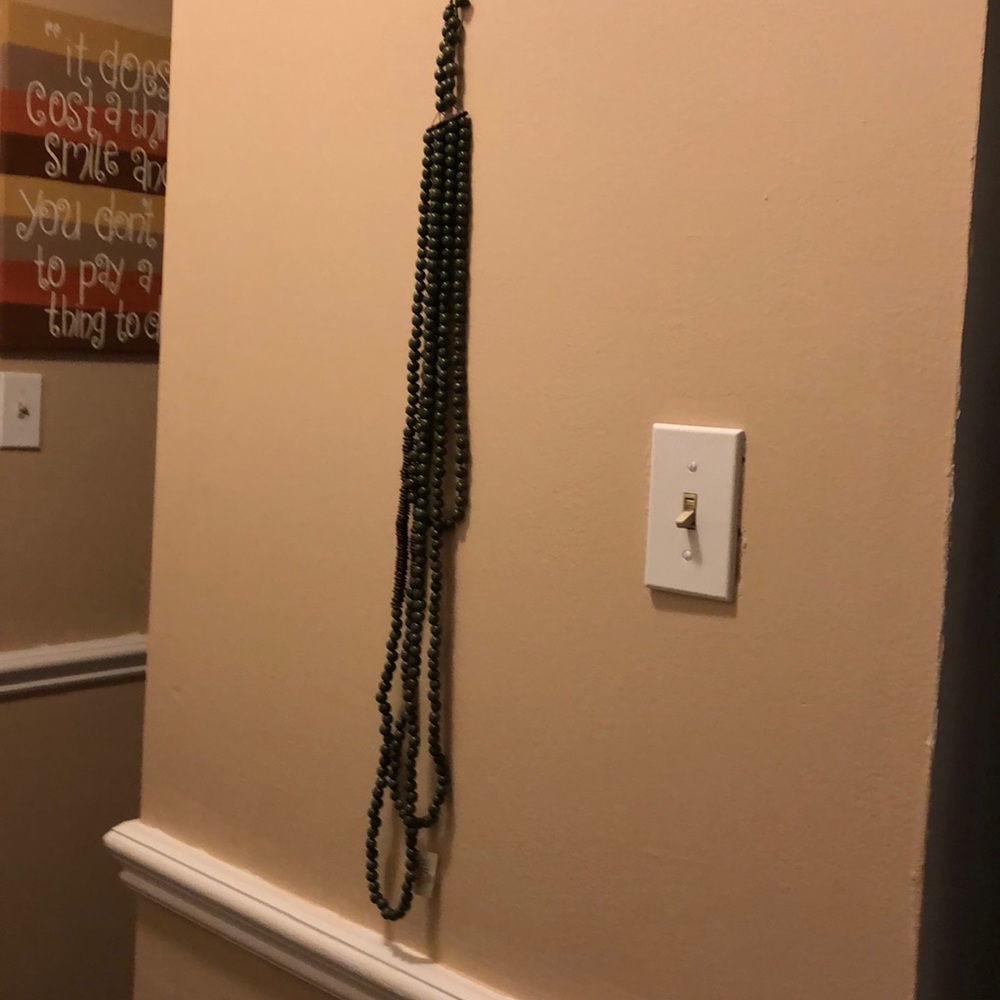 Triple strand necklace.  28” long